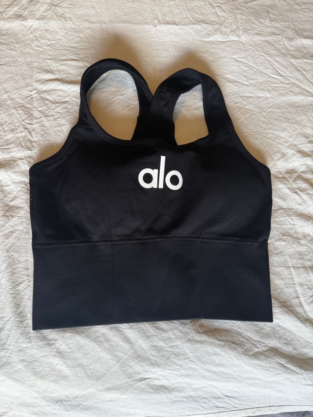 ALO Yoga Black Sports Bra with White Logo Print. Sewn in padding